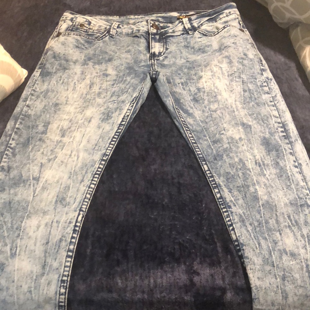 2 pair of light washed jeans